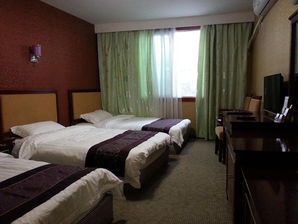 Jiuxiang Hotel Цзючжайгоу Экстерьер фото